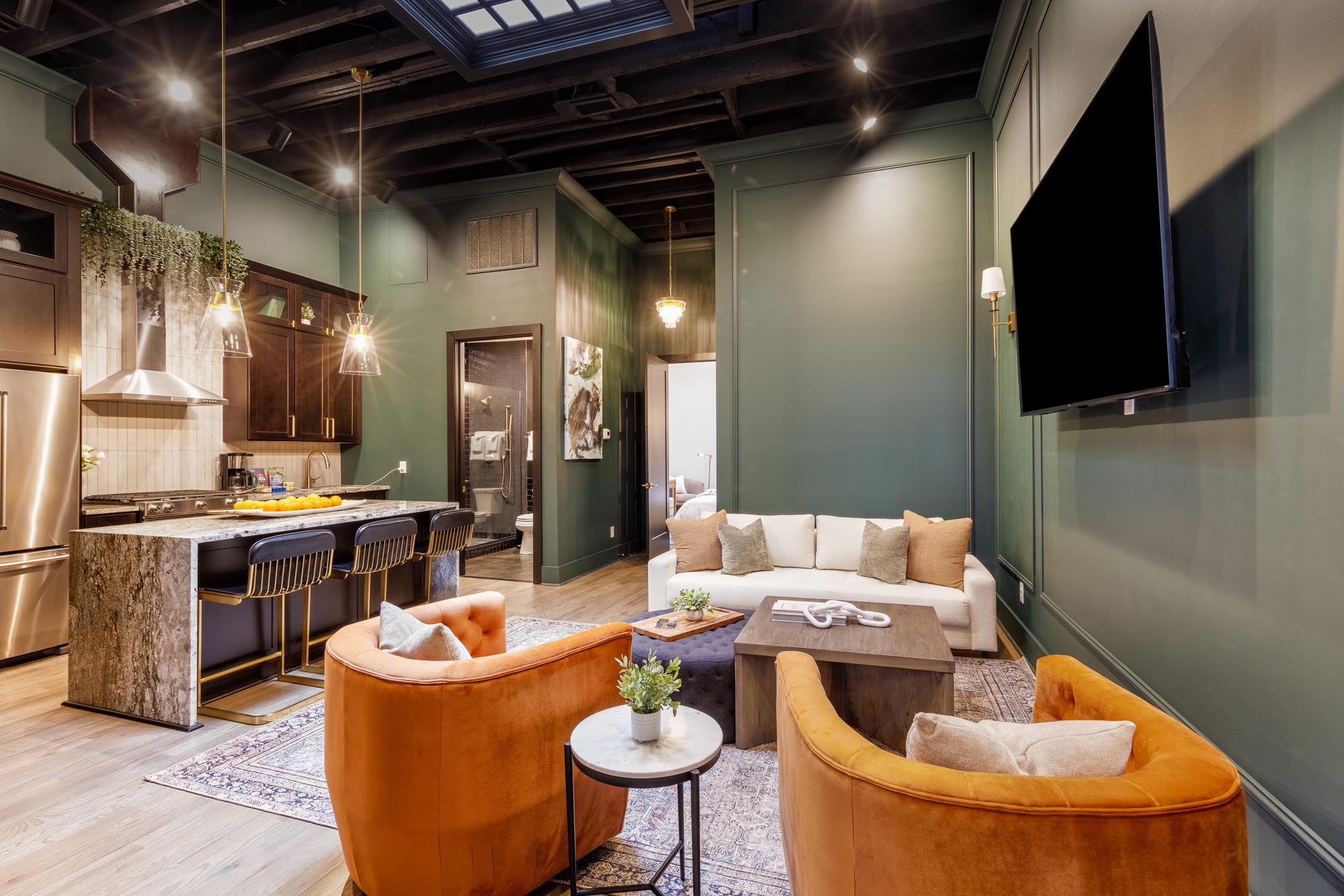 Chairs set up next to tv in living area